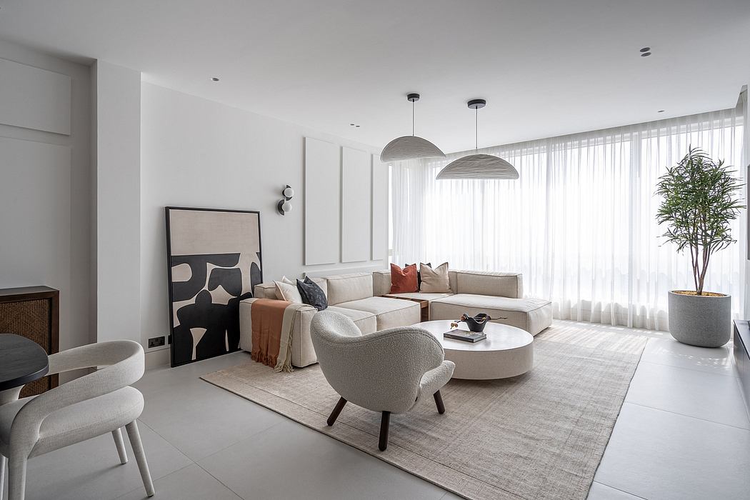 Sleek, modern living room with plush seating, pendant lighting, and a minimalist aesthetic.