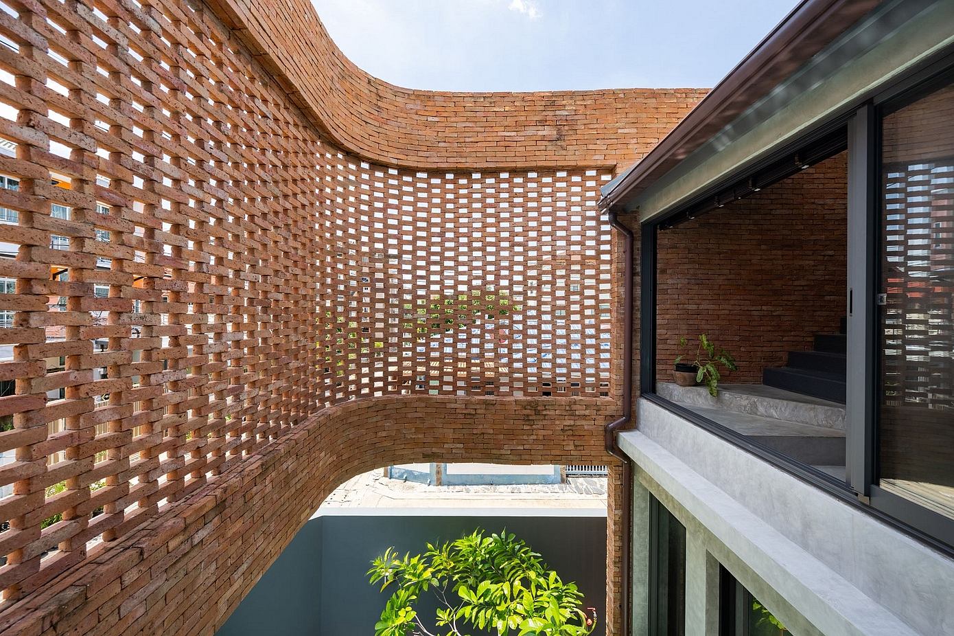 011-myj-house-eco-friendly-residential-design-with-exposed-brick.jpg