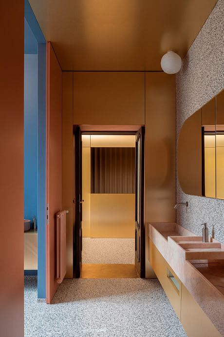 A colorful hallway with striking architectural elements and modern design details.