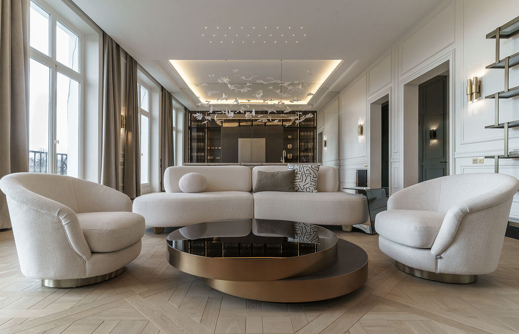 Luxurious contemporary living room with intricate lighting, sleek furnishings, and a striking metallic coffee table.
