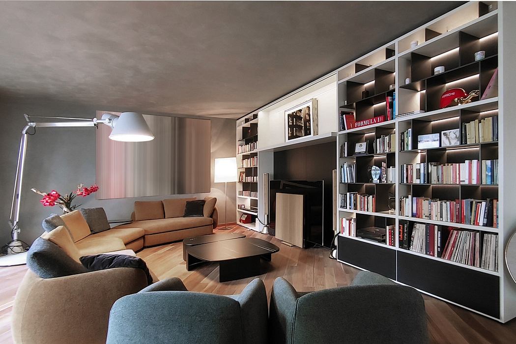 Cozy living room with built-in bookshelves, plush sofas, and a modern coffee table.
