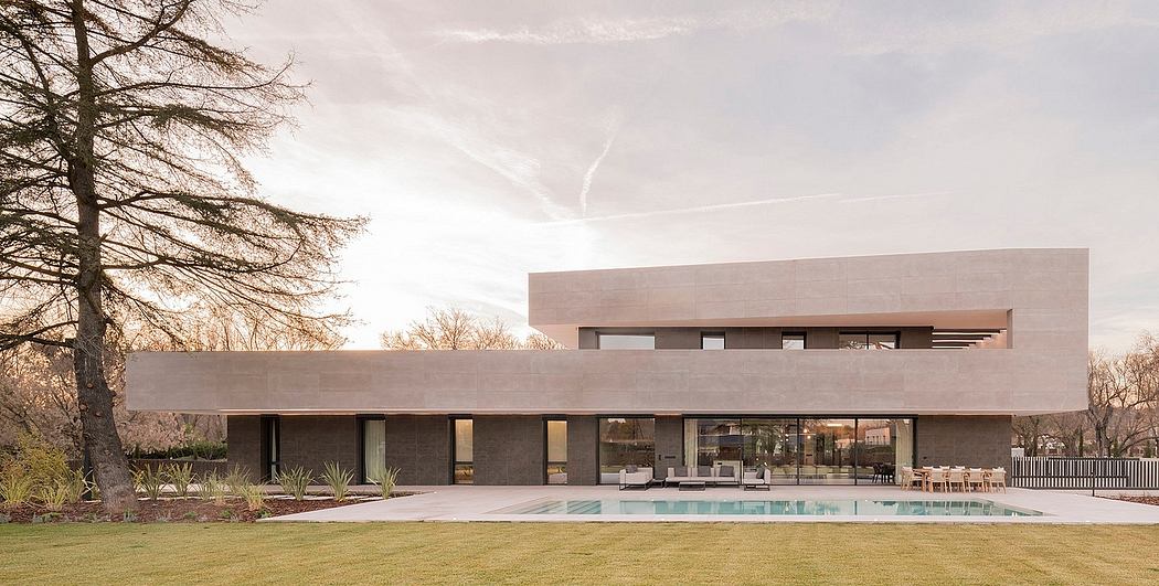 A modern, minimalist single-story home with a pool, large windows, and a flat roof.