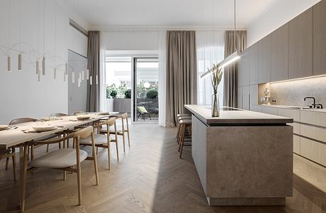 Minimalist kitchen and dining area with neutral colors, wood furnishings, and large windows.