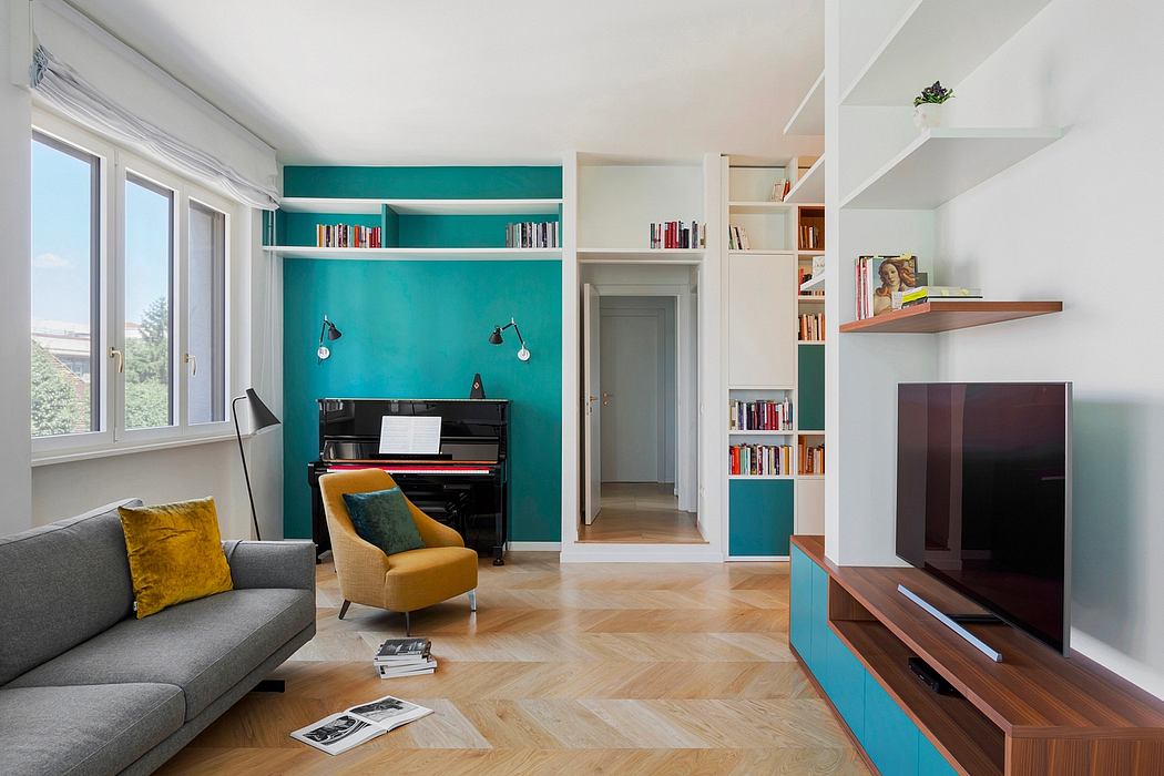 Vibrant living room with teal accent wall, built-in bookshelves, and a piano.