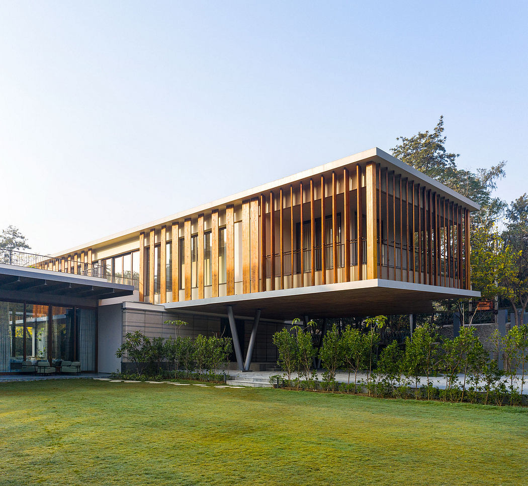 Striking modern architecture with wooden cladding and projecting upper floors.