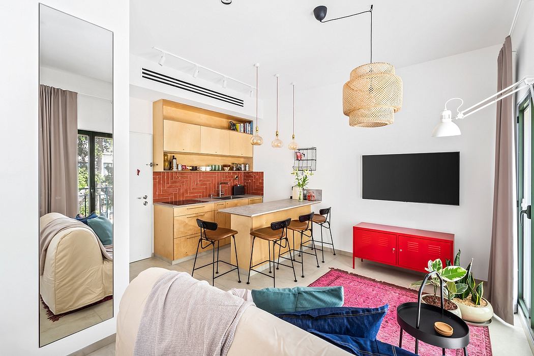 Bright, modern kitchen with wooden cabinetry, red tiled backsplash, and an open floor plan.