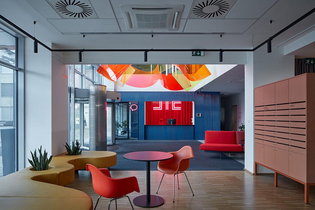 Vibrant, contemporary office space with bold colors, geometric patterns, and modular furnishings.