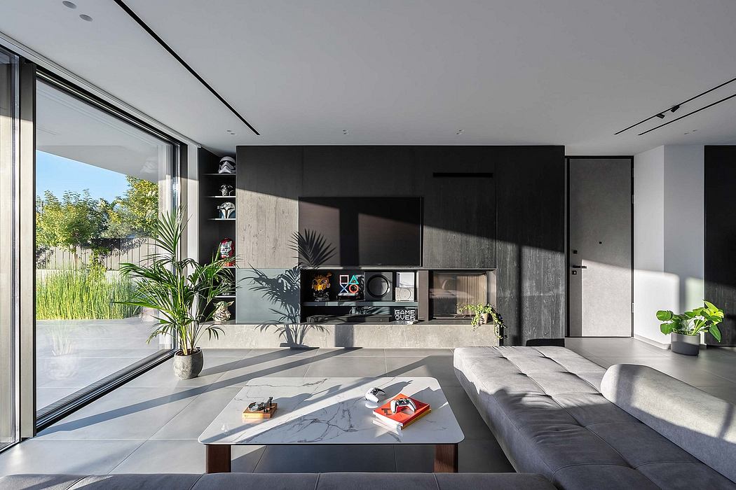 Sleek, minimalist living room with floor-to-ceiling windows, monochromatic palette, and modern furnishings.