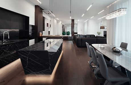 Sleek, modern interior with black marble countertops, hanging lights, and a large sofa in the living area.