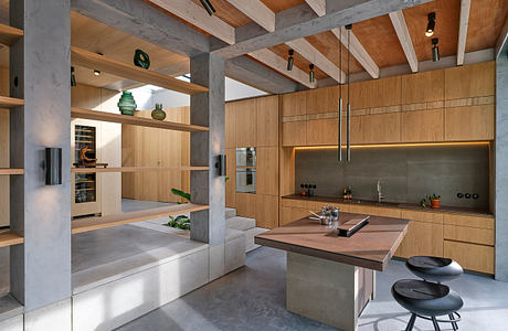 Sleek, modern kitchen with concrete and wood accents, open shelving, and island seating.