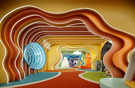 Surreal, colorful, and undulating architectural interior with unusual shapes and lighting.