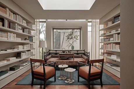 Large, bright living space with built-in bookcases, natural lighting, and mid-century modern furnishings.