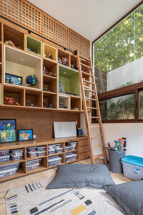 Intricate wooden shelving and storage system with ladder access, complementing the natural light and greenery.