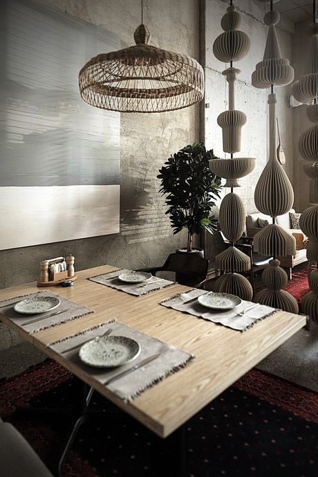 Dramatic lighting fixtures and rustic wood table create a moody, artistic ambiance.