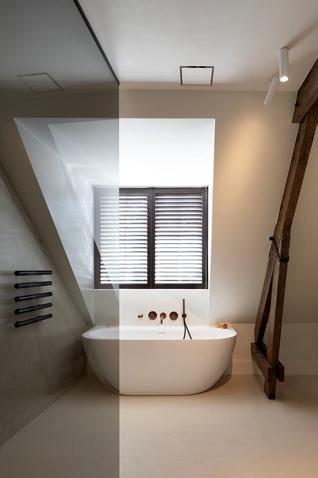 Minimalist bathroom design with a freestanding tub, slatted window, and wooden accents.