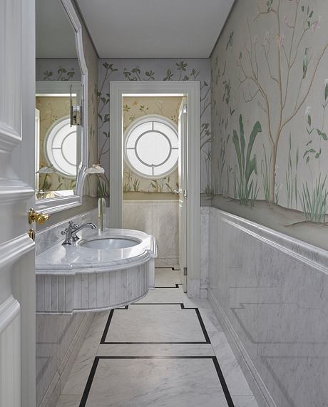 A luxurious bathroom with intricate floral wallpaper, marble vanity, and arched windows.