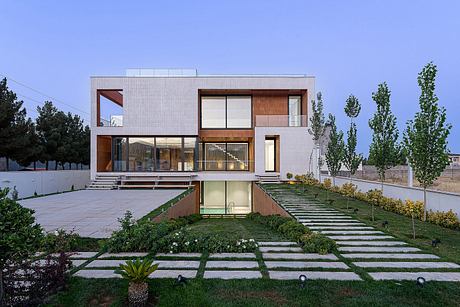 Striking modern home with clean lines, wood accents, and well-designed landscaping.