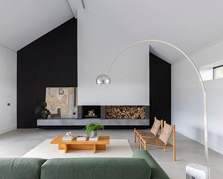 Modern living room with sleek fireplace, wood accents, and minimalist furniture.