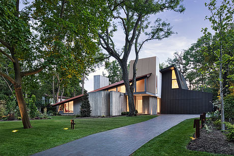 A contemporary home with clean lines, wooden accents, and a striking exterior design.