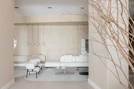 Sleek, minimalist lounge space with modern furnishings and natural wood accents.