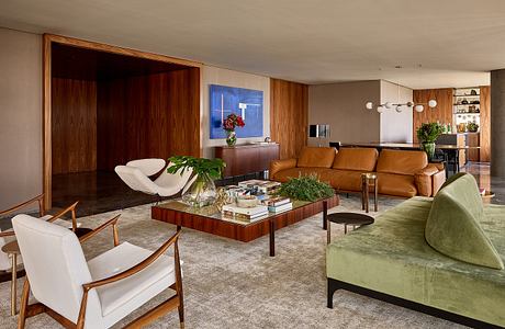 Elegant mid-century modern living room with rich wood paneling, plush furnishings, and eye-catching artwork.