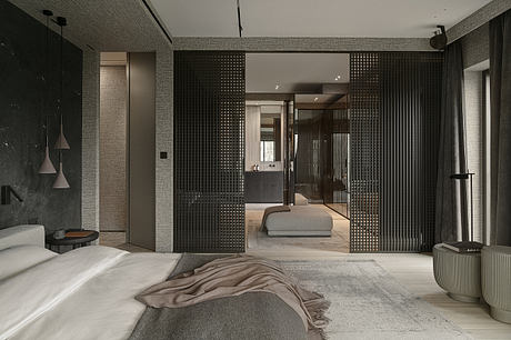 Minimalist bedroom interior with textured grey walls, perforated metal partitions, and modern lighting.