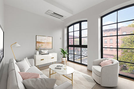 Bright, modern living room with large arched windows, light furnishings, and minimalist decor.