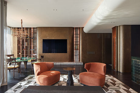 Richly textured living room with earthy tones, geometric floor, and statement lighting.