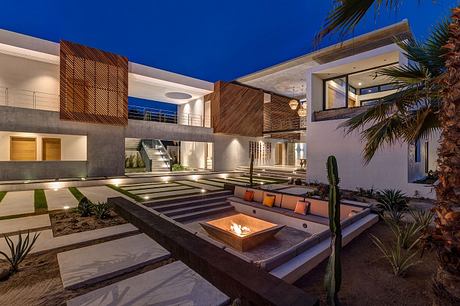 Stunning modern architecture with sleek lines, warm wood accents, and luxurious outdoor living space.