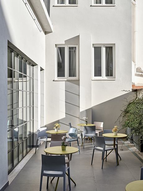 Modern architectural design with minimalist furniture and natural lighting.