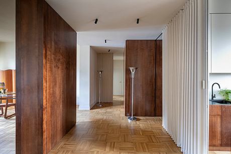 A modern interior with warm wood tones, clean lines, and sophisticated decor.