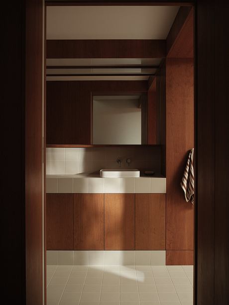 A well-lit bathroom with a minimalist, geometric design featuring wooden cabinetry and tiles.
