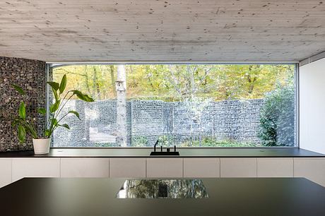 Banánka House features Y-Shaped Floor Plan Dividing Garden into Segments - 6