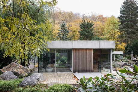 Banánka House features Y-Shaped Floor Plan Dividing Garden into Segments - 12