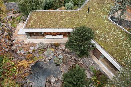 Banánka House features Y-Shaped Floor Plan Dividing Garden into Segments - 14