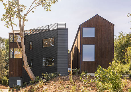 Corvidae Co-op — Gabled Units, Generous Windows, Everyday Community - 1