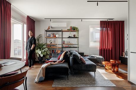 KSS Apartment Frames Warm Modern Interiors with Marble and Velvet - 1