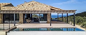 Maison TO Anchors a Mountain-to-Sea Retreat with Local Stone in Corsica