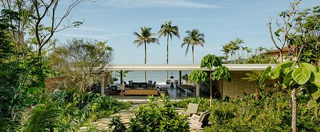 Patios House Landscaping: Lush Paths Guide A Seaside Home - 1