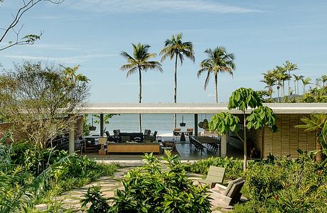 Patios House Landscaping: Lush Paths Guide A Seaside Home
