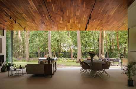 Travelers’ House: Tent-Like Roof Orients Life Around a Central Atrium