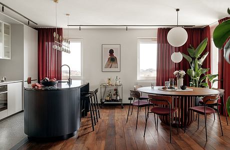 KSS Apartment Frames Warm Modern Interiors with Marble and Velvet