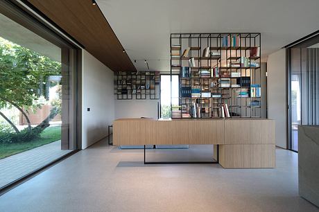 House in Misano Adriatico Pairs Warm Wood With Cool Stone Surfaces - 3