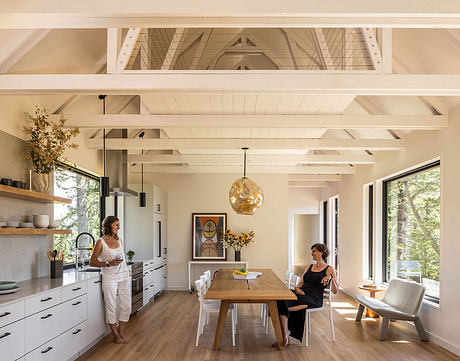 North South House Suspends a Family Cabin Above a Forested Ridge Site - 3