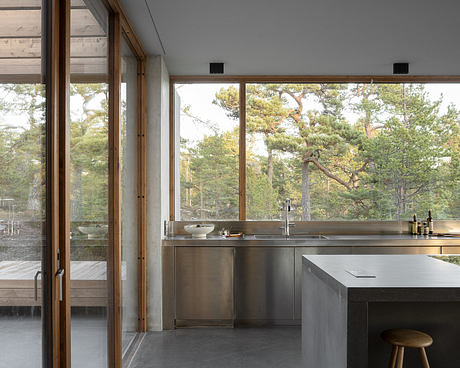 House Djurö Refines Indoor–Outdoor Living with Concrete Terrace - 4