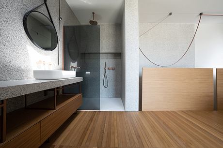 House in Misano Adriatico Pairs Warm Wood With Cool Stone Surfaces - 5