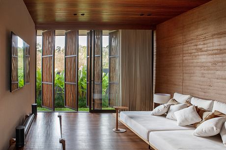 Taipa House Reimagines Vernacular Taipa For a Warm Modern Retreat - 6