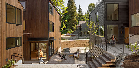 Corvidae Co-op — Gabled Units, Generous Windows, Everyday Community - 7