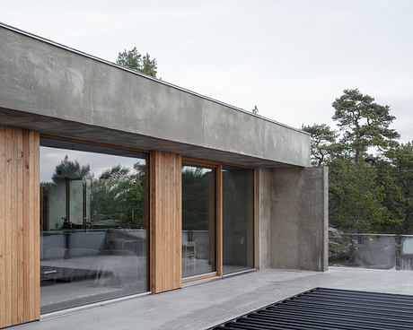 House Djurö Refines Indoor–Outdoor Living with Concrete Terrace - 8