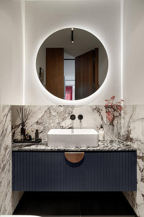 KSS Apartment Frames Warm Modern Interiors with Marble and Velvet - 6